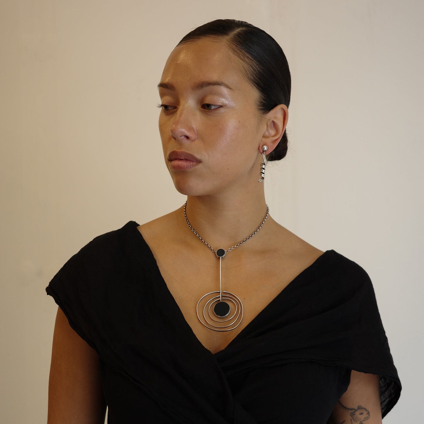 Finnish orbit statement neck piece