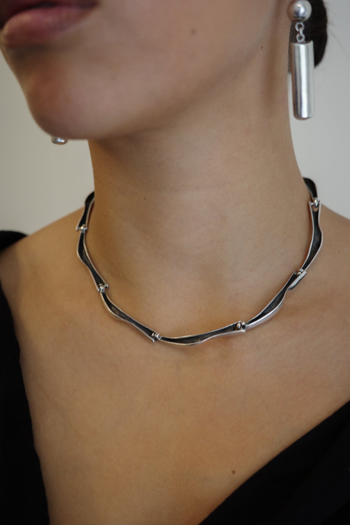 Reversible wave link chain