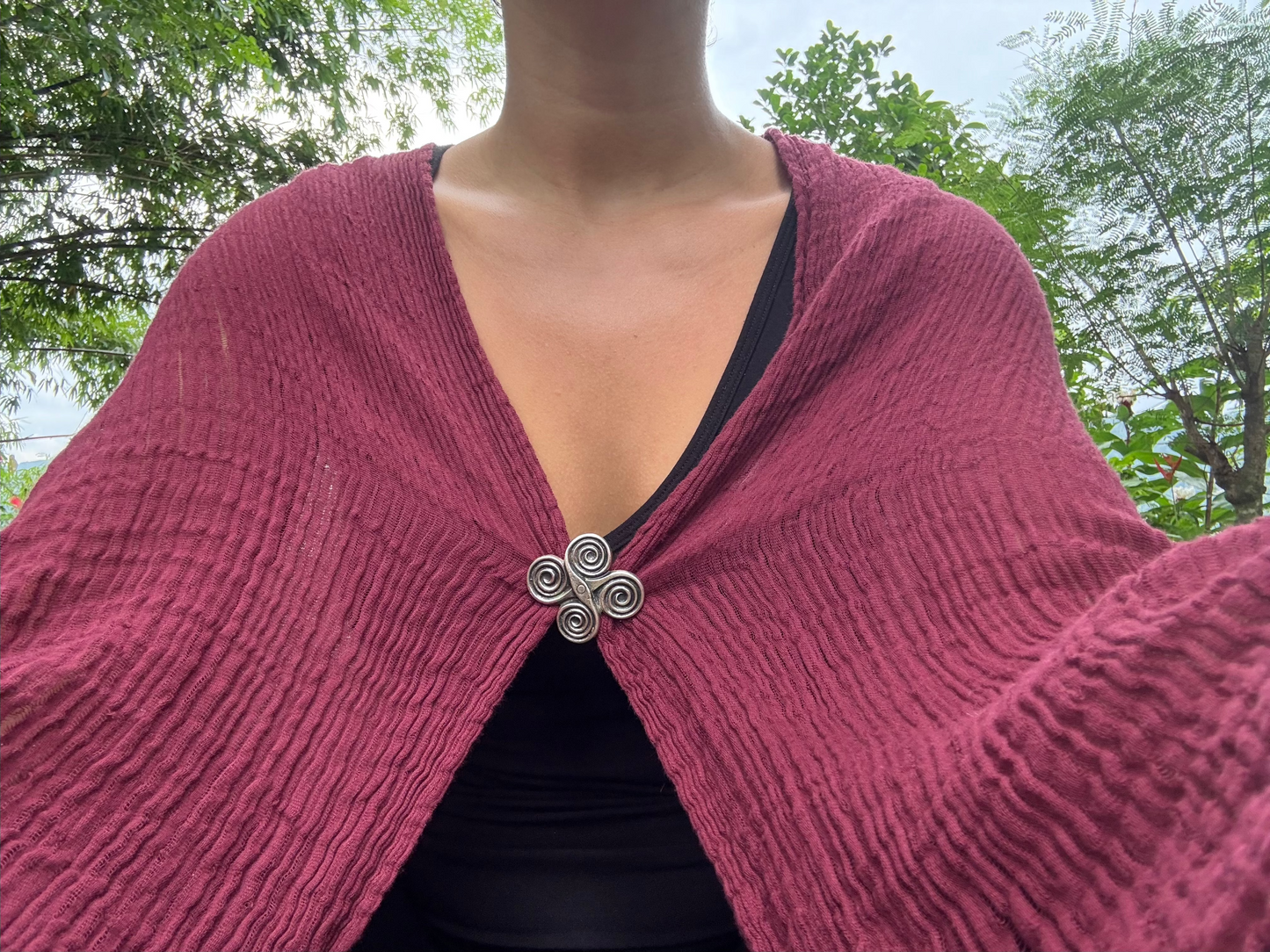 Handcrafted sun brooch