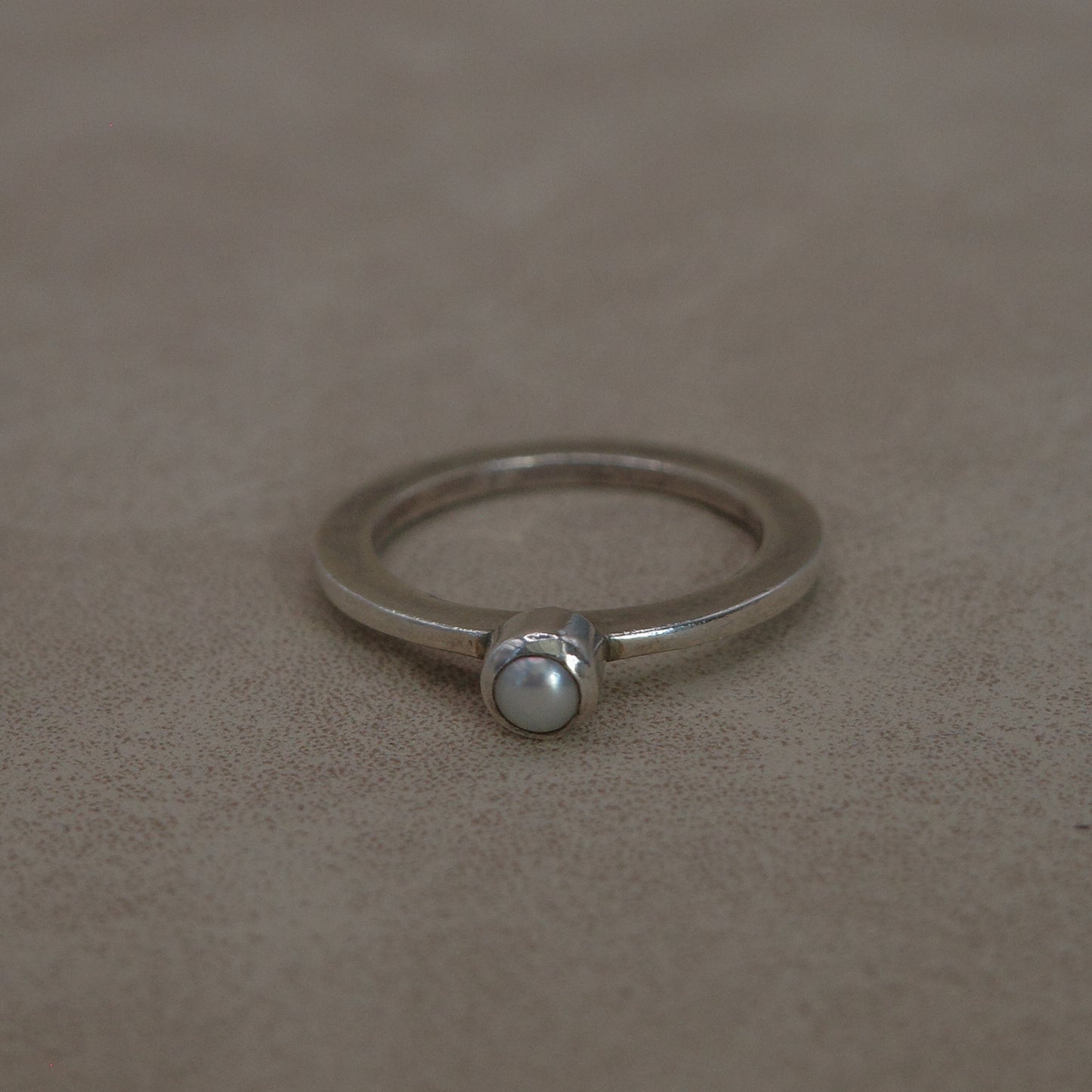 Flat thin band baby pearl ring