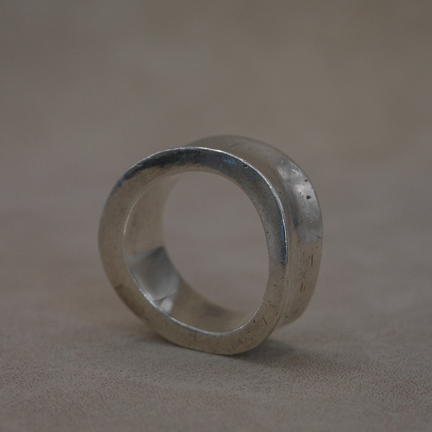 Solid wave band ring with sharp edges
