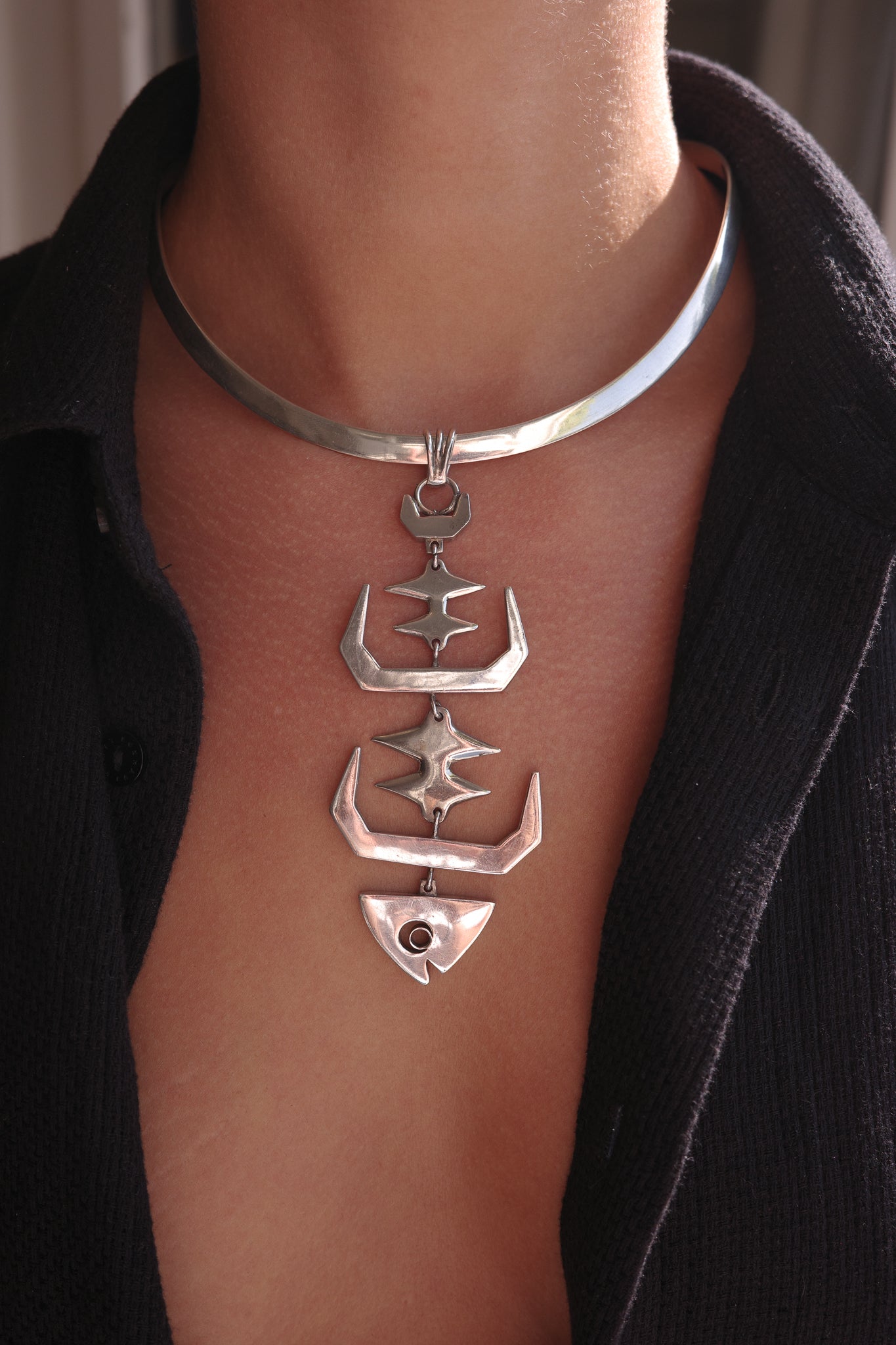 Modernist sterling fish bone pendant