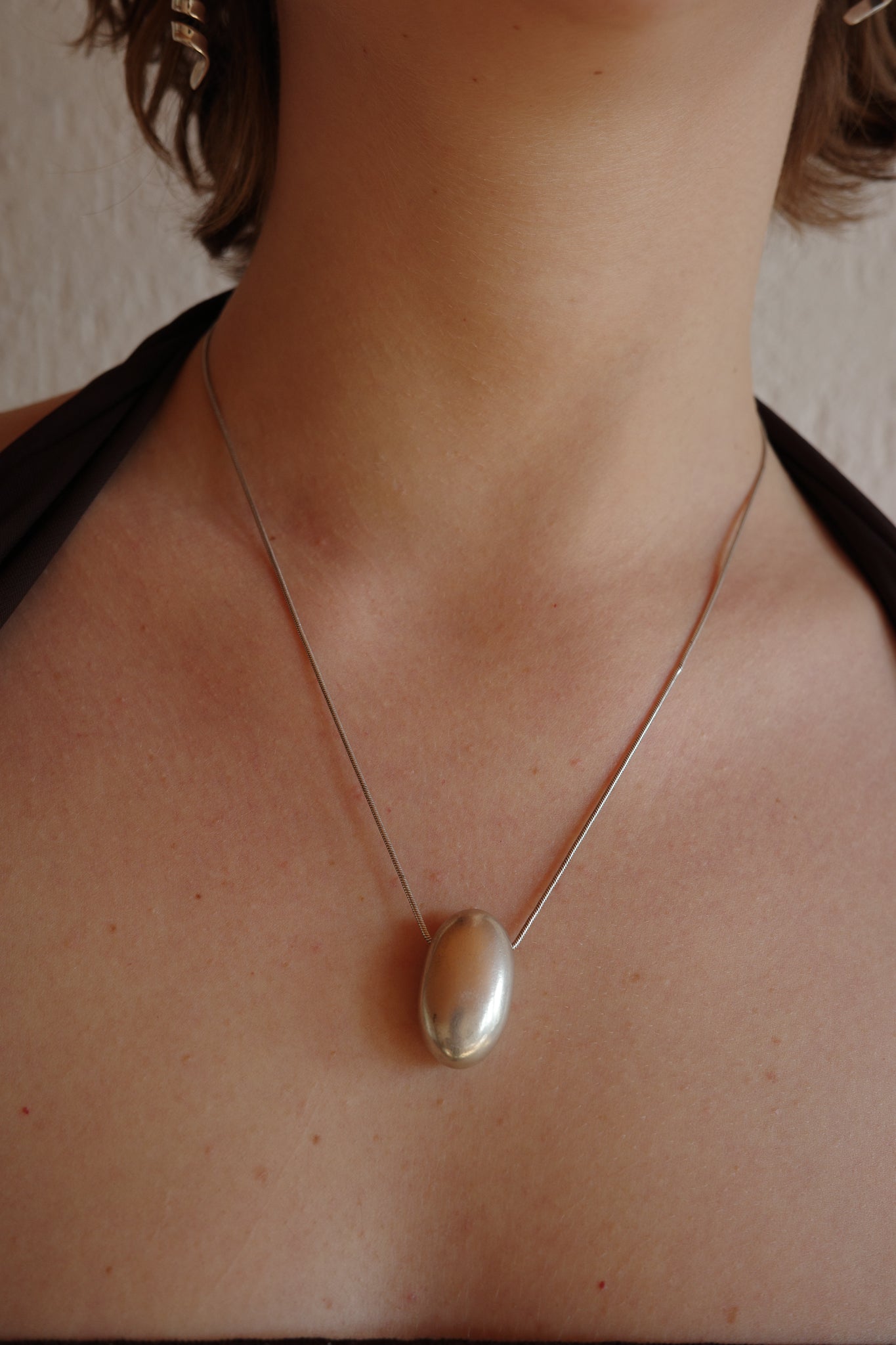 Solid silver egg pendant