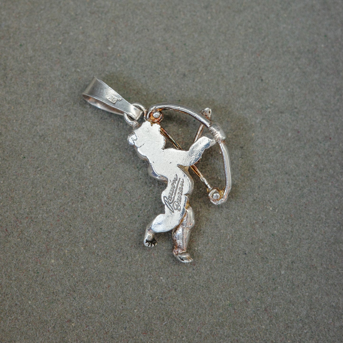 Realistic cupid silver pendant