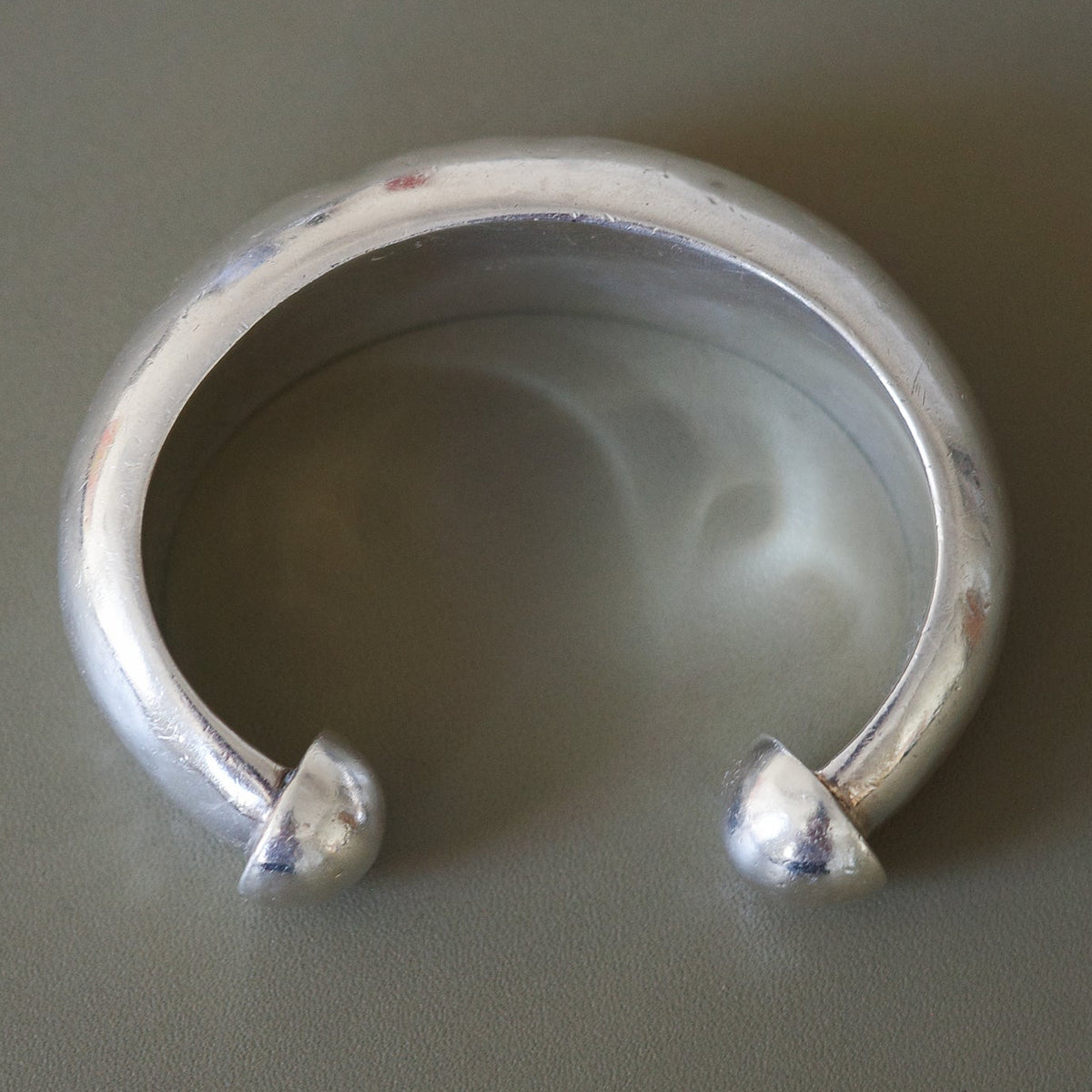 Domed end cuff