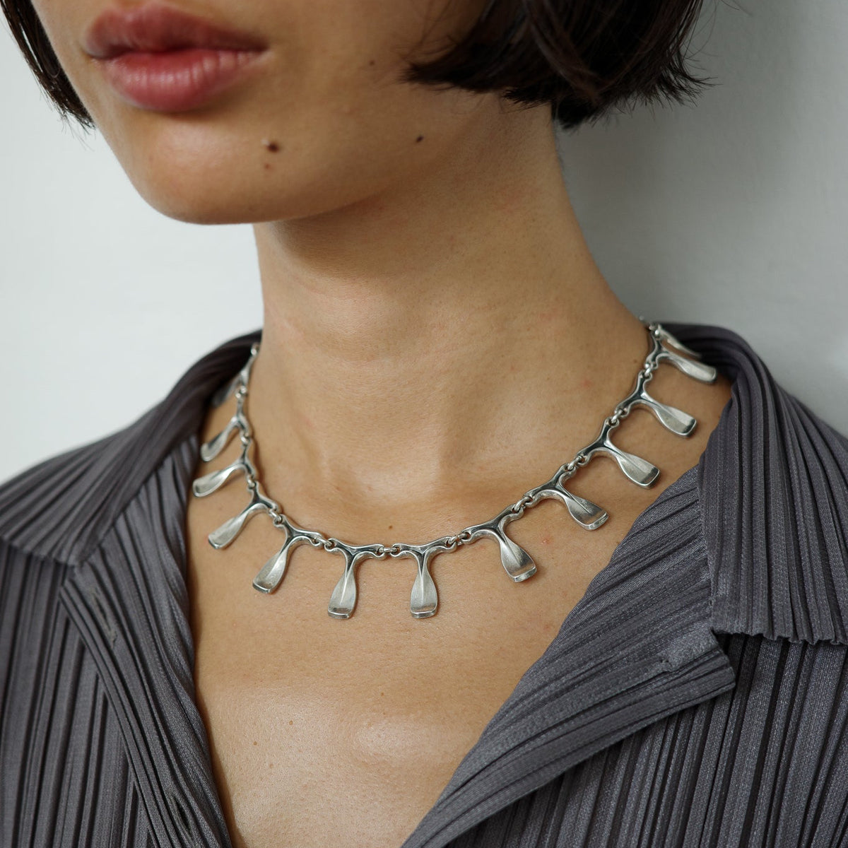 Studio-crafted 60s neck piece