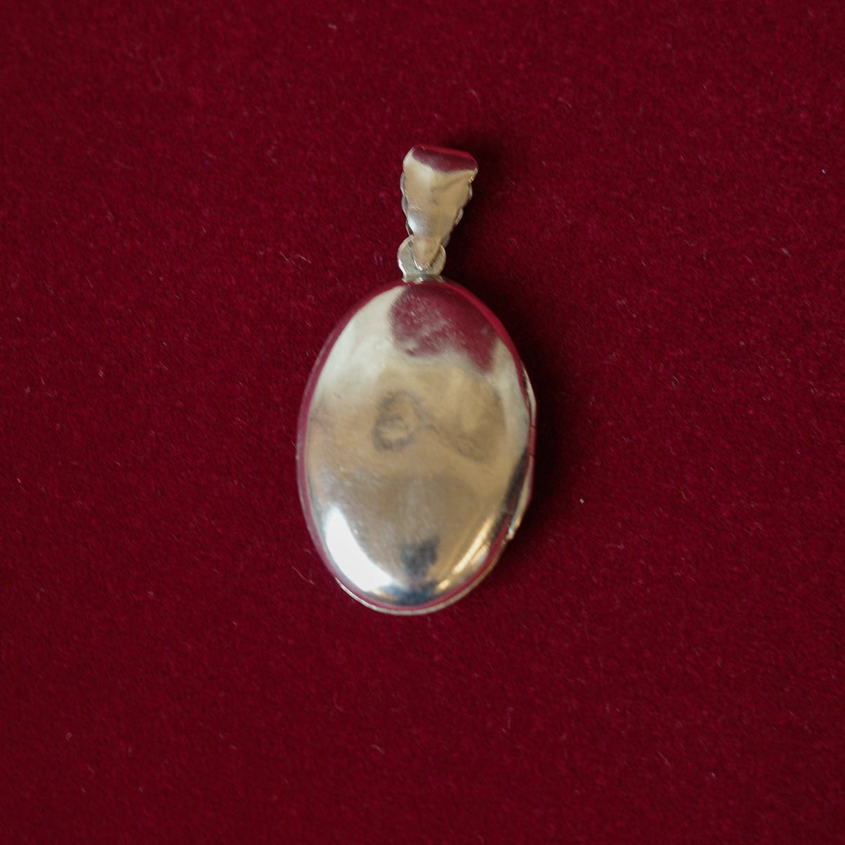 Oval locket silver pendant