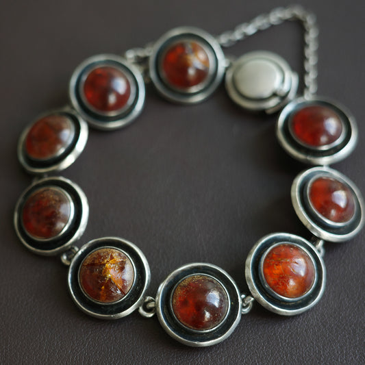 N.E From amber bracelet