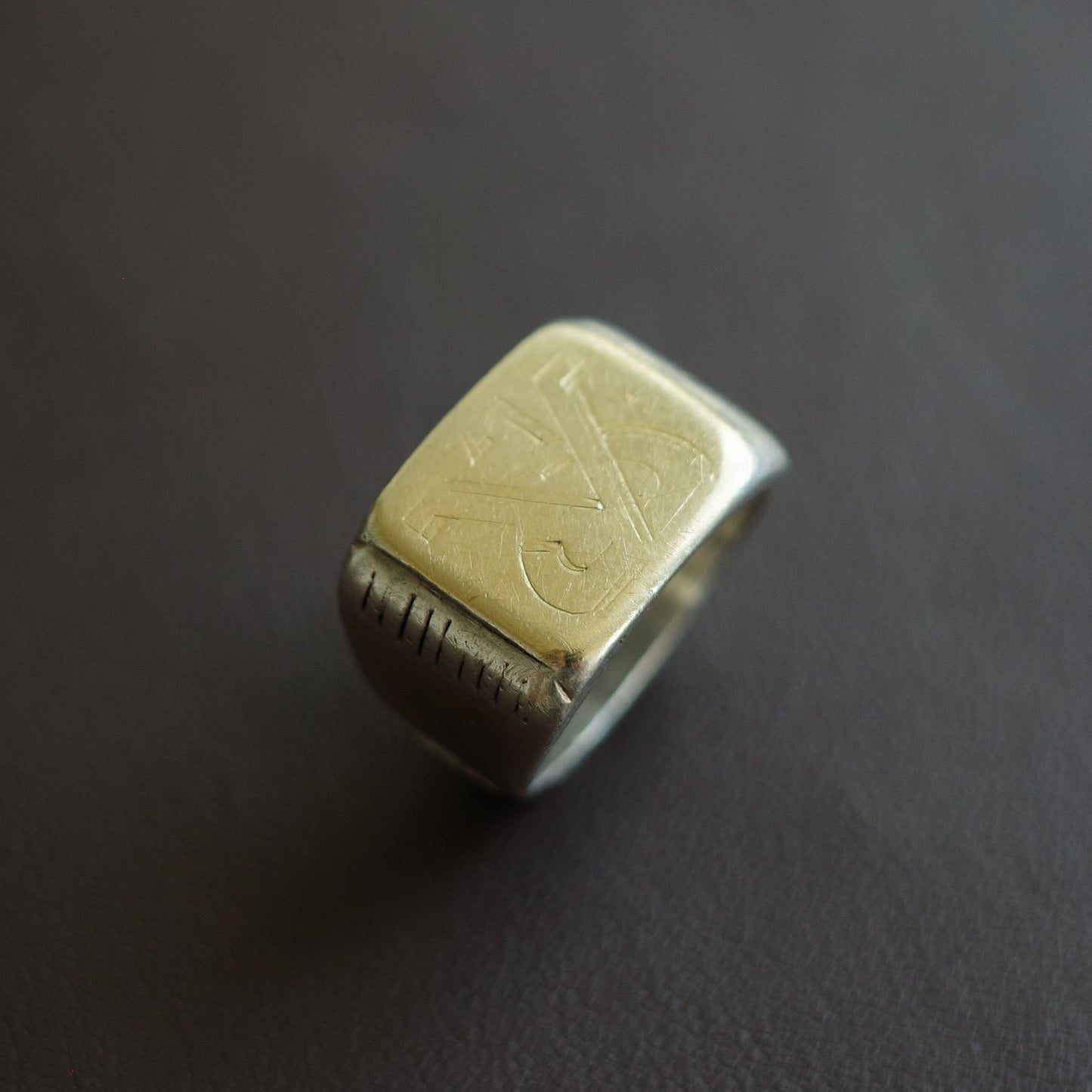 Antique signet ring with golden top