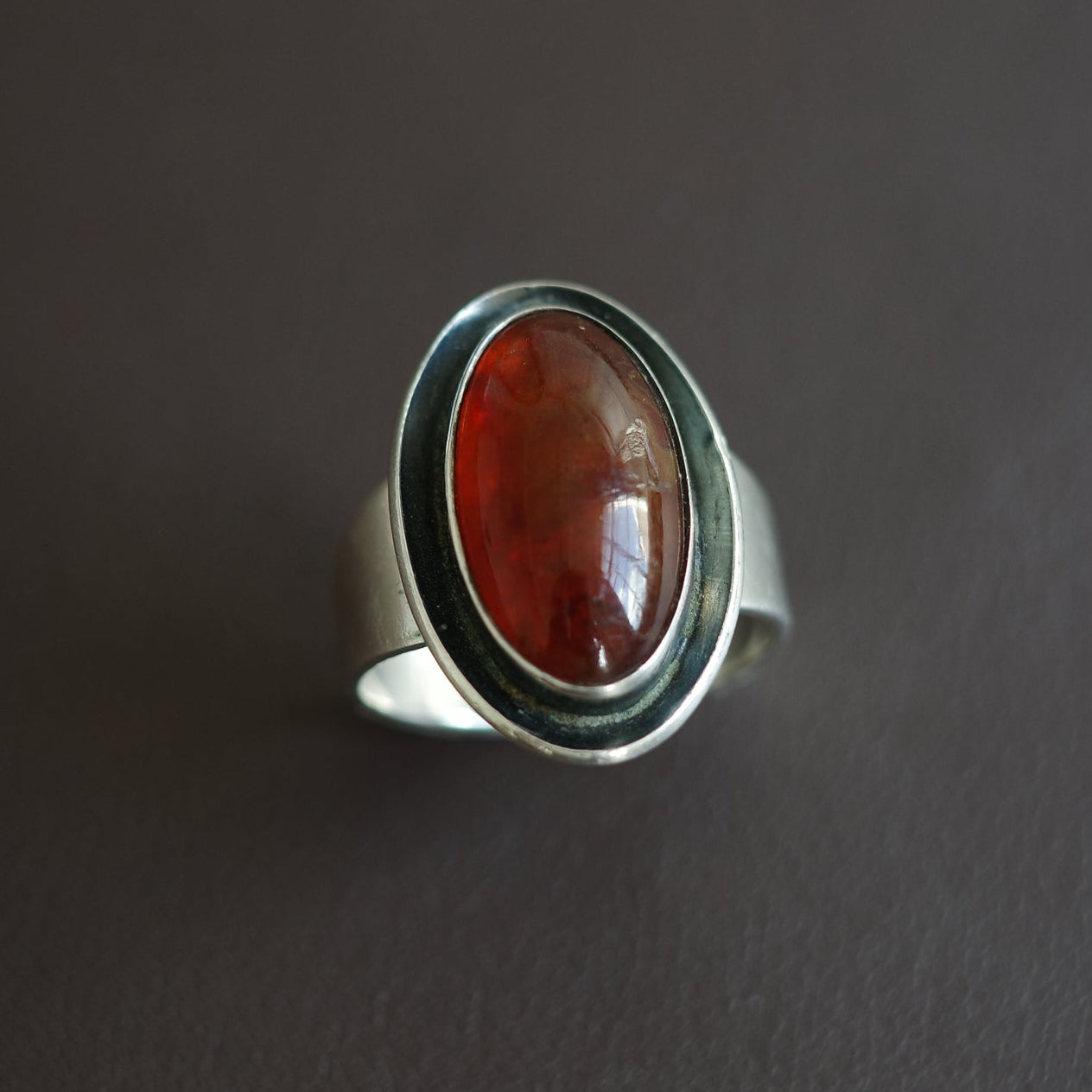 N.E From Oval Amber ring