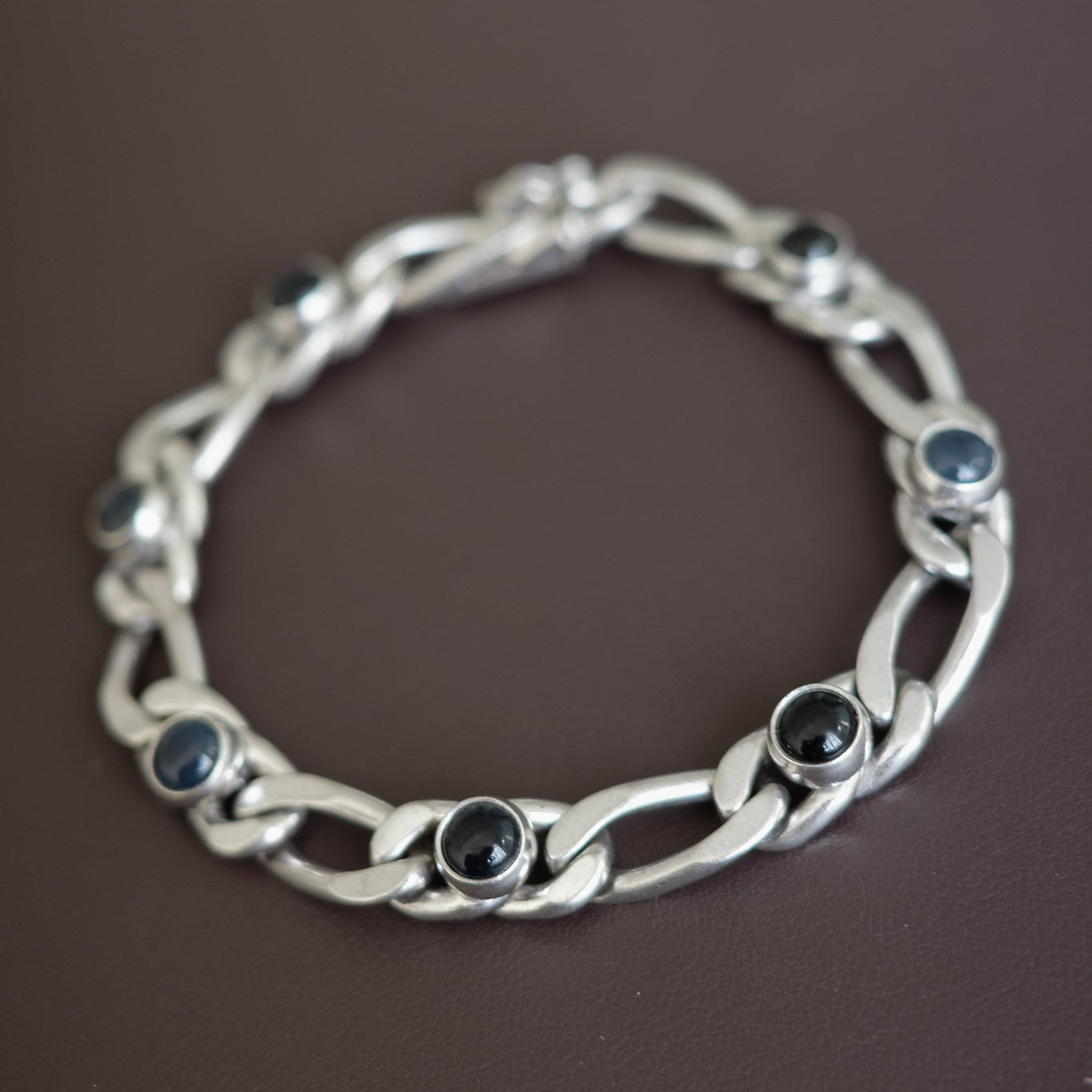 Figaro link bracelet with onyx settings