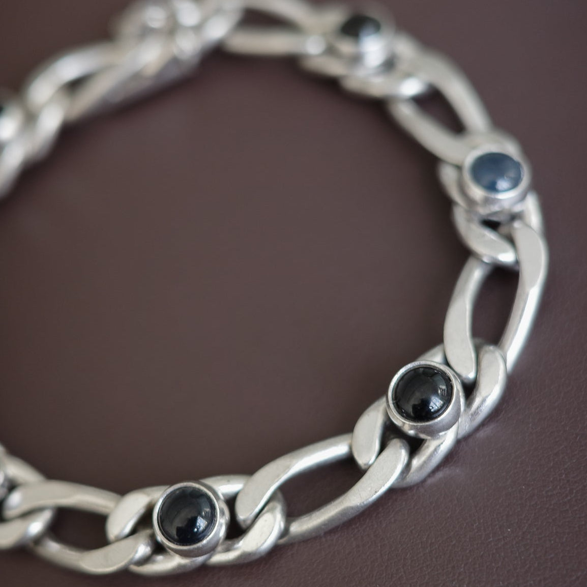 Figaro link bracelet with onyx settings