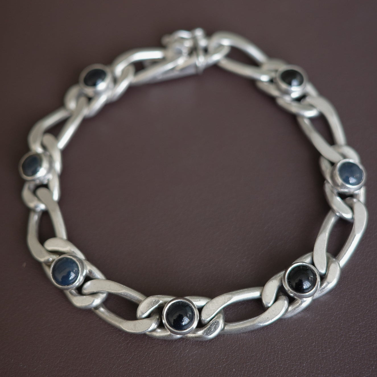Figaro link bracelet with onyx settings