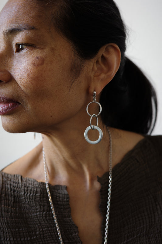 Modernist trio of silver hoops