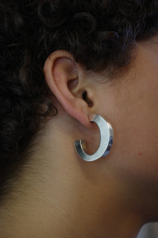 C-shaped Mexican modernist hoops