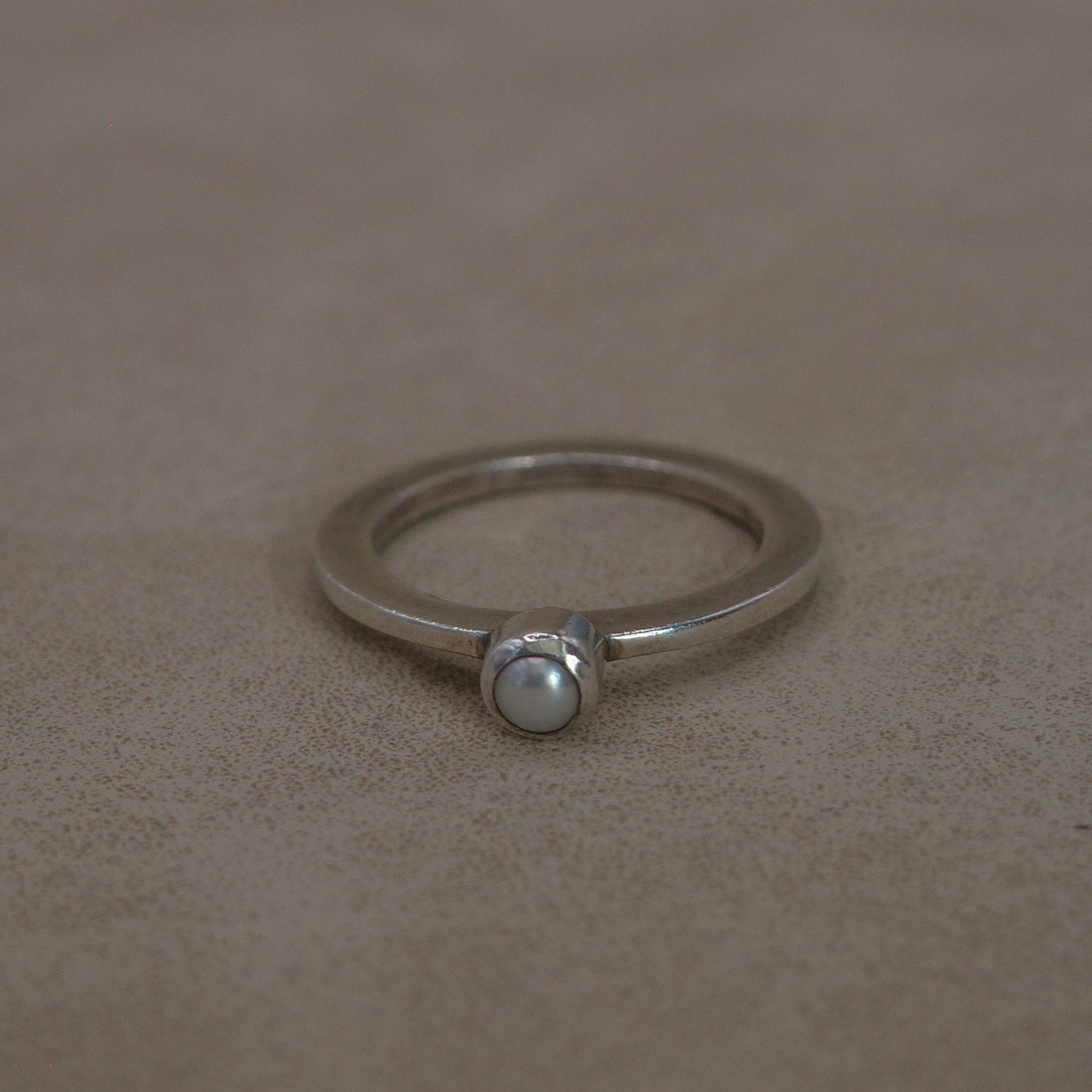 Flat thin band baby pearl ring
