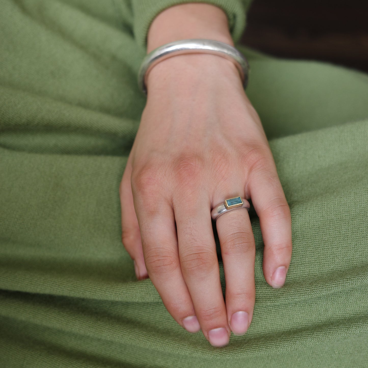 Aquamarine with golden rim ring