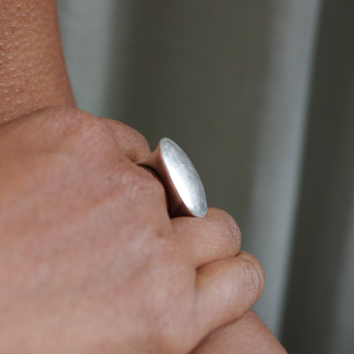 Modernist solid oval ring