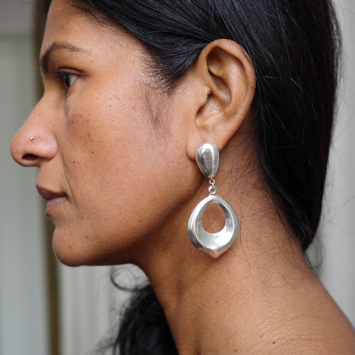 Modernist open studs