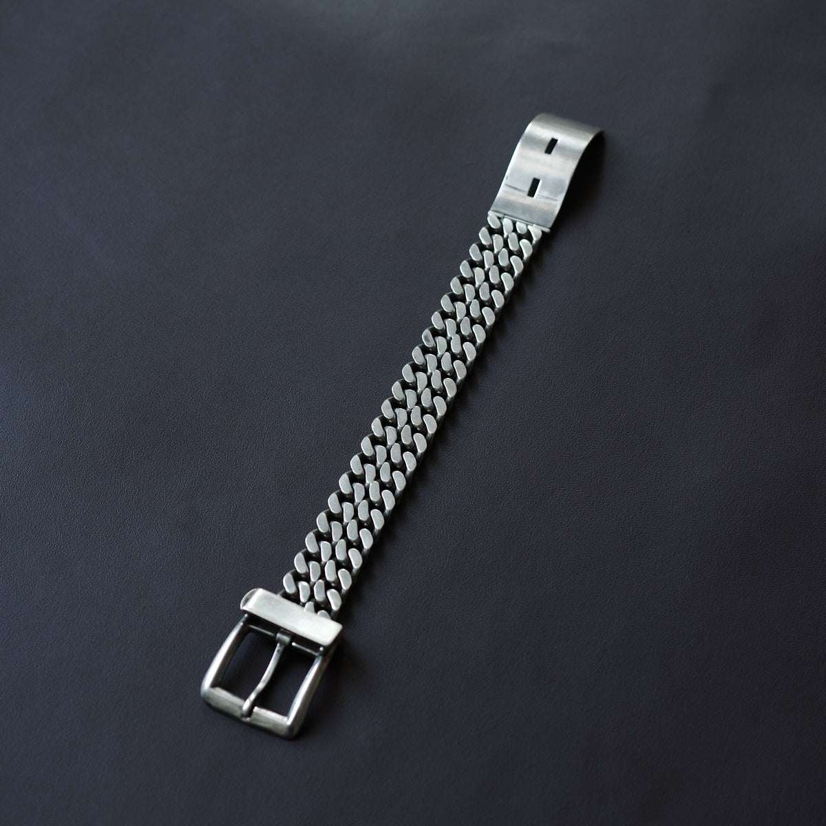 Belt buckle curb chain bracelet