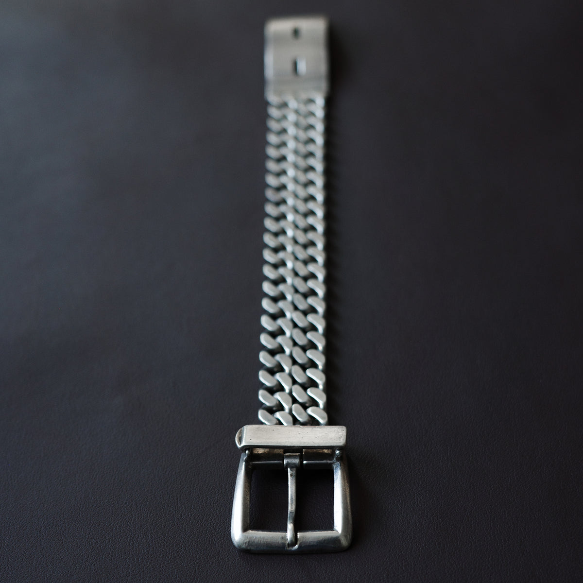 Belt buckle curb chain bracelet