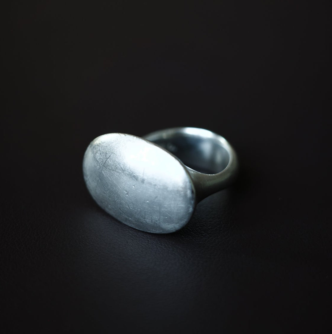 Modernist solid oval ring