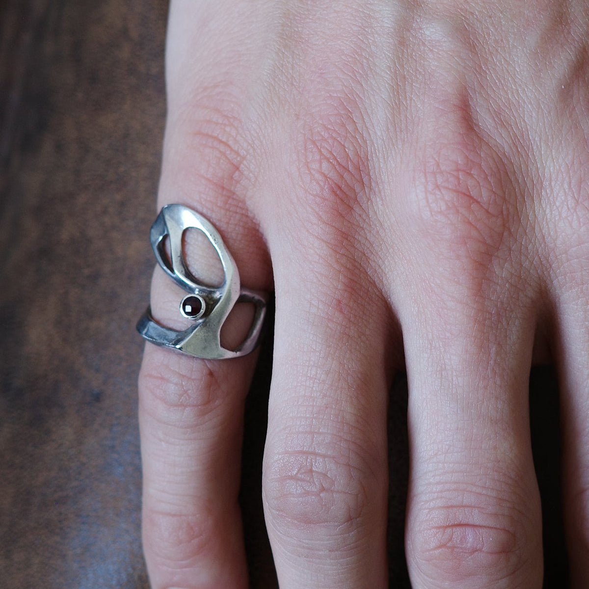 Brutalist wrap ring with garnet