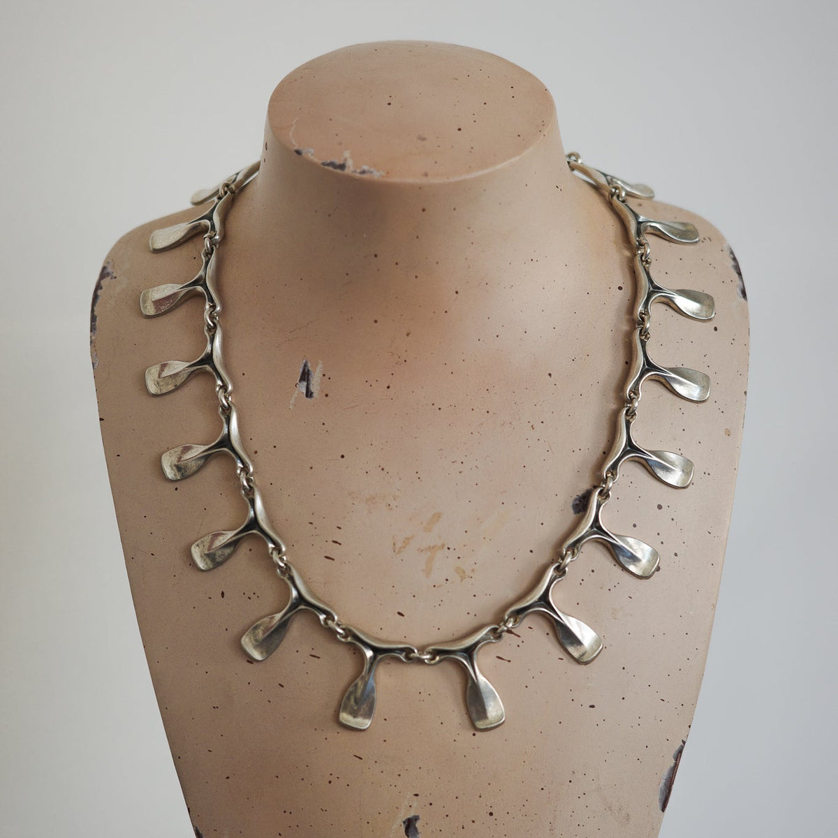 Studio-crafted 60s neck piece