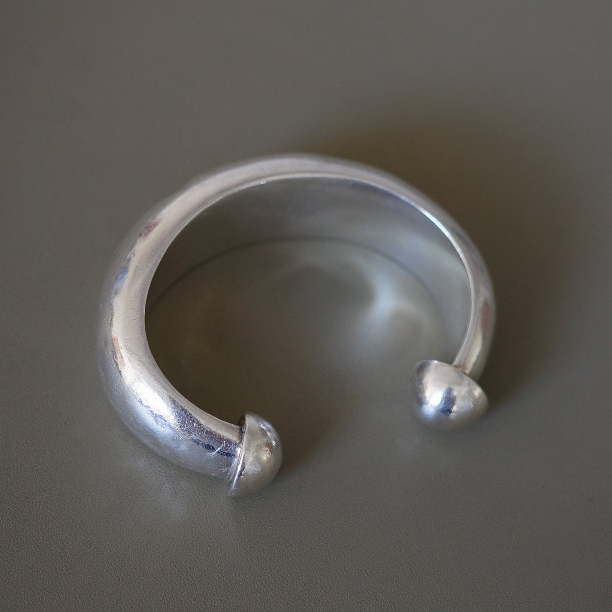 Domed end cuff