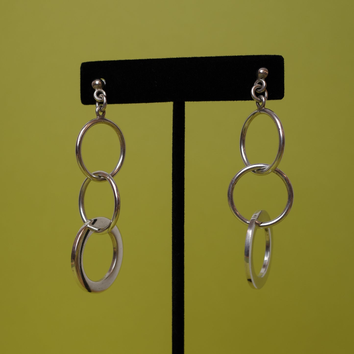Modernist trio of silver hoops