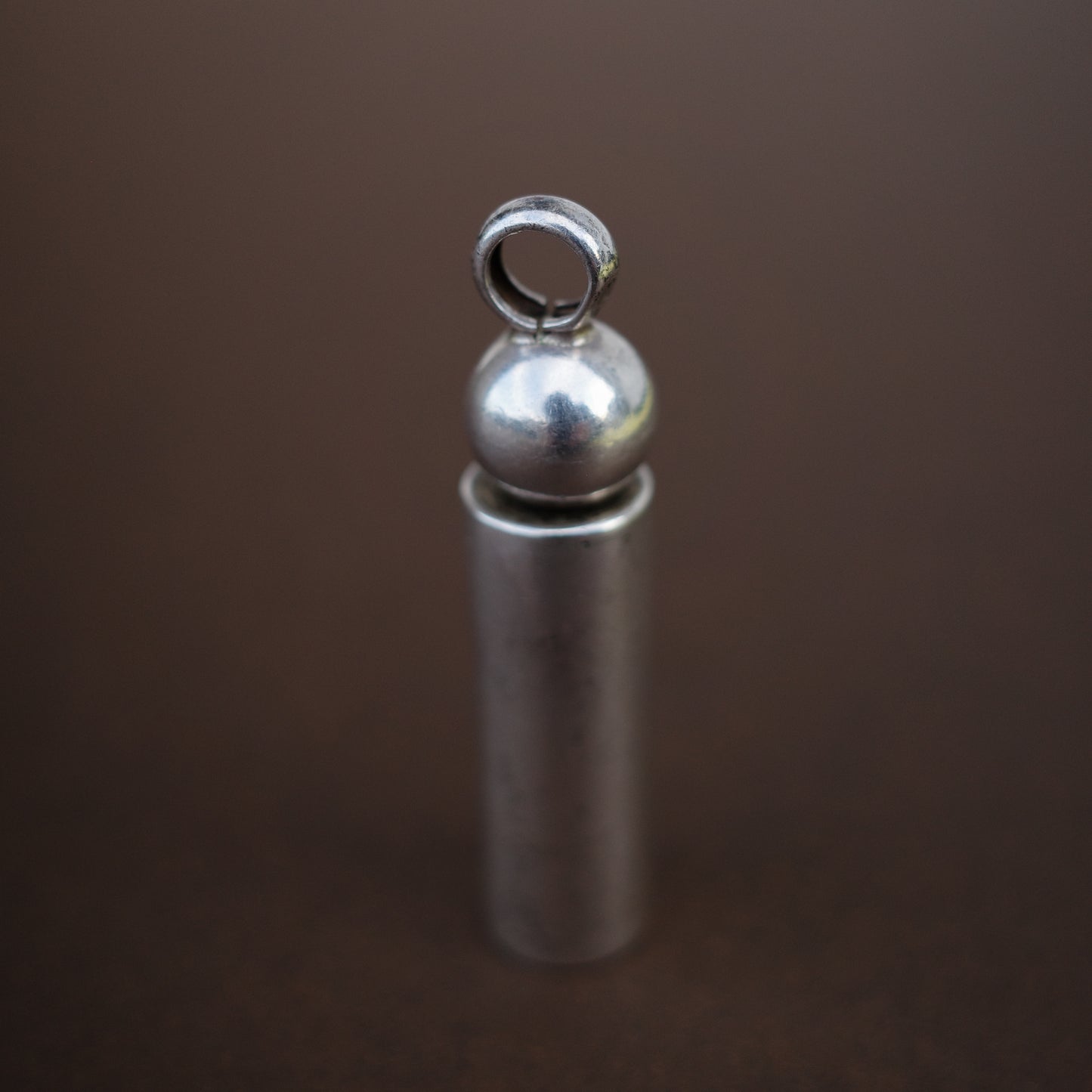 Secret screw pendant