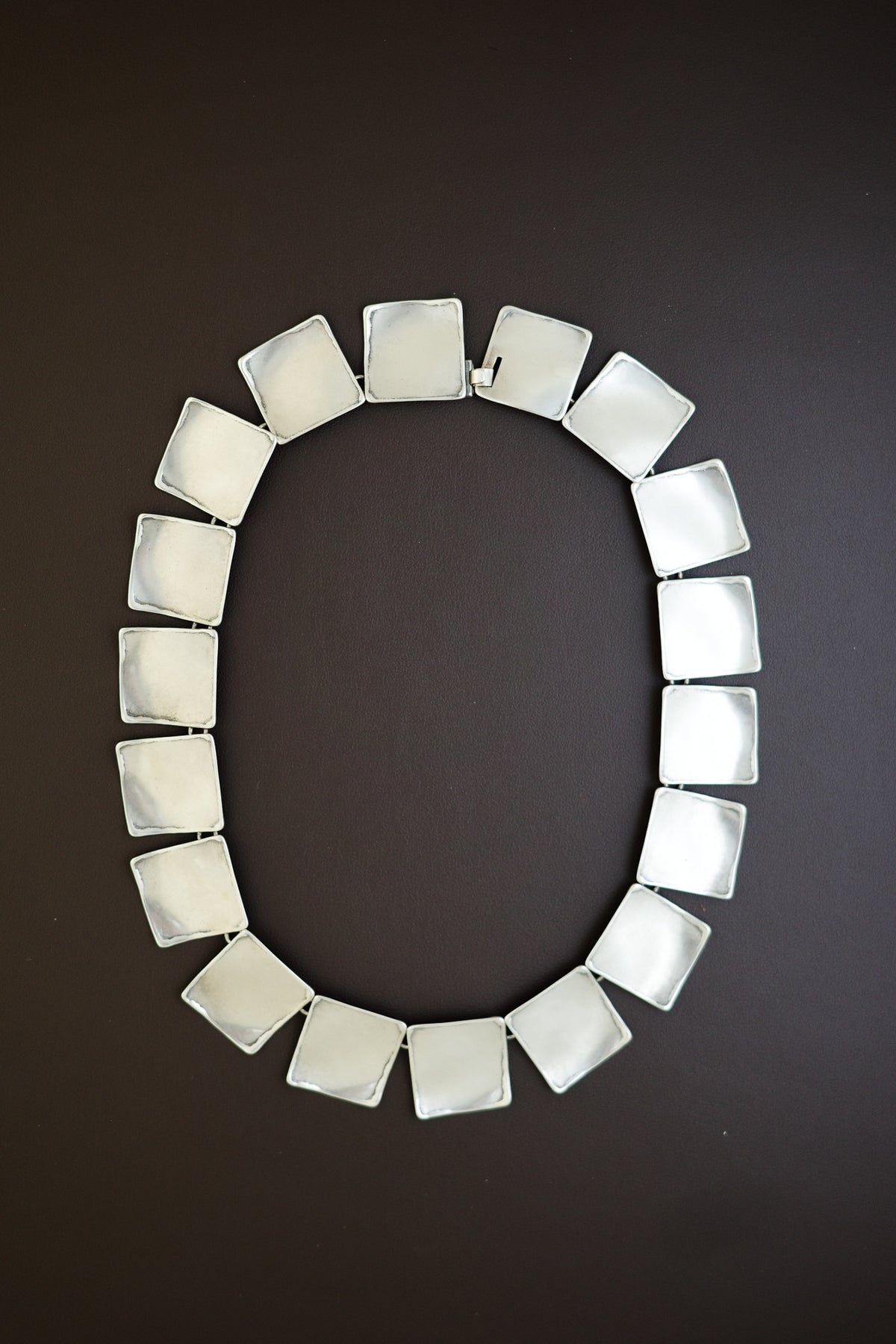Square pannel neck piece