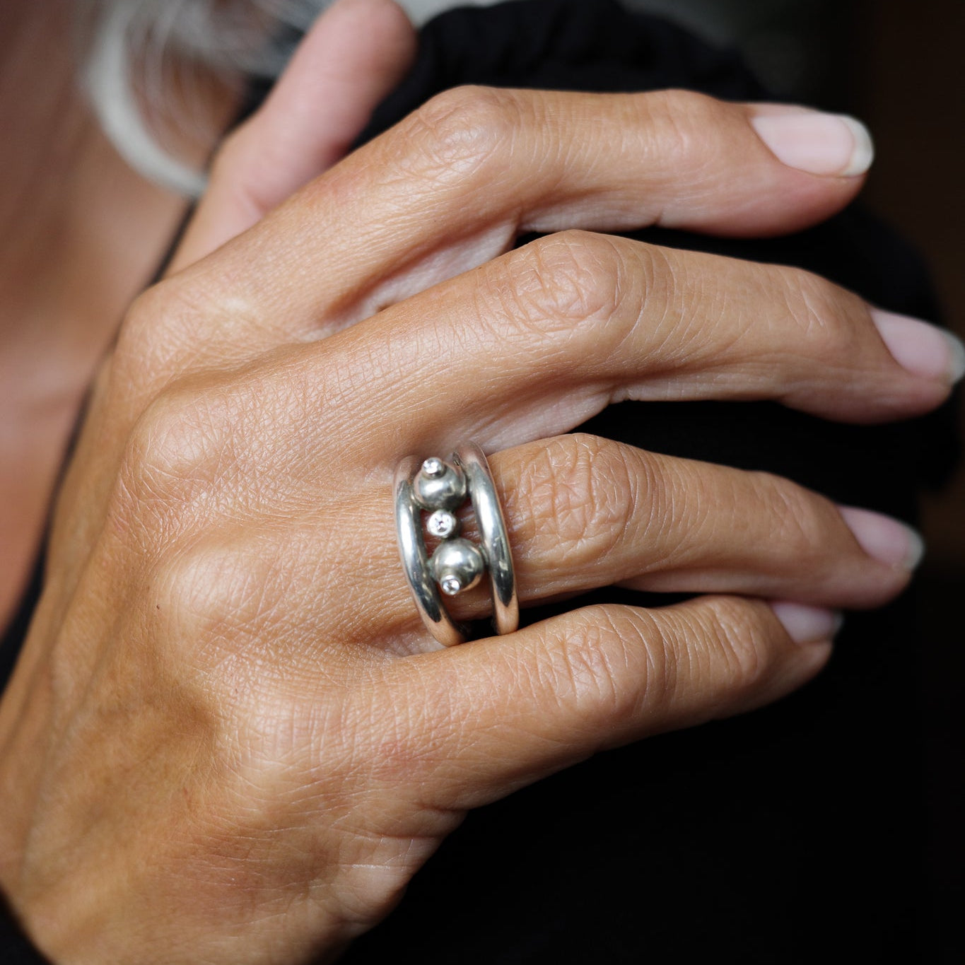 Studio-crafted three orbit ring