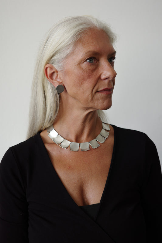 Square pannel neck piece