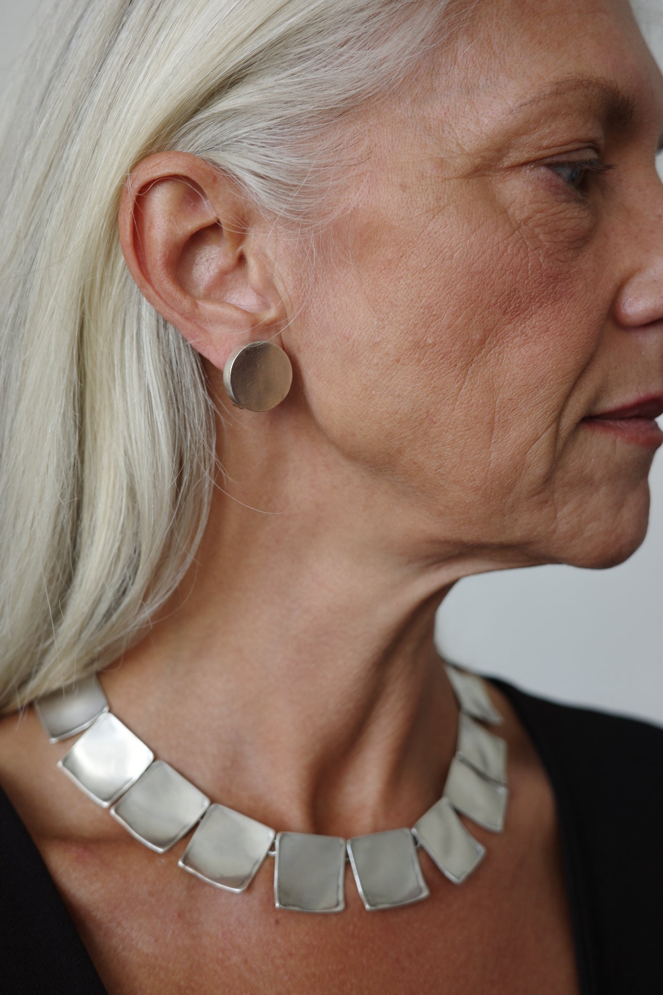 Square pannel neck piece