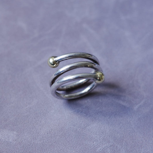 Spiral sterling ring with gold endings
