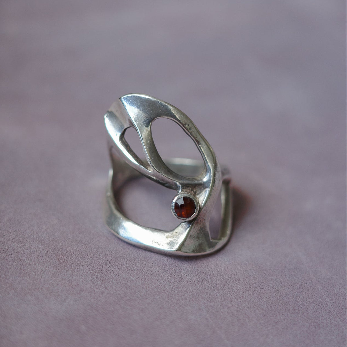 Brutalist wrap ring with garnet