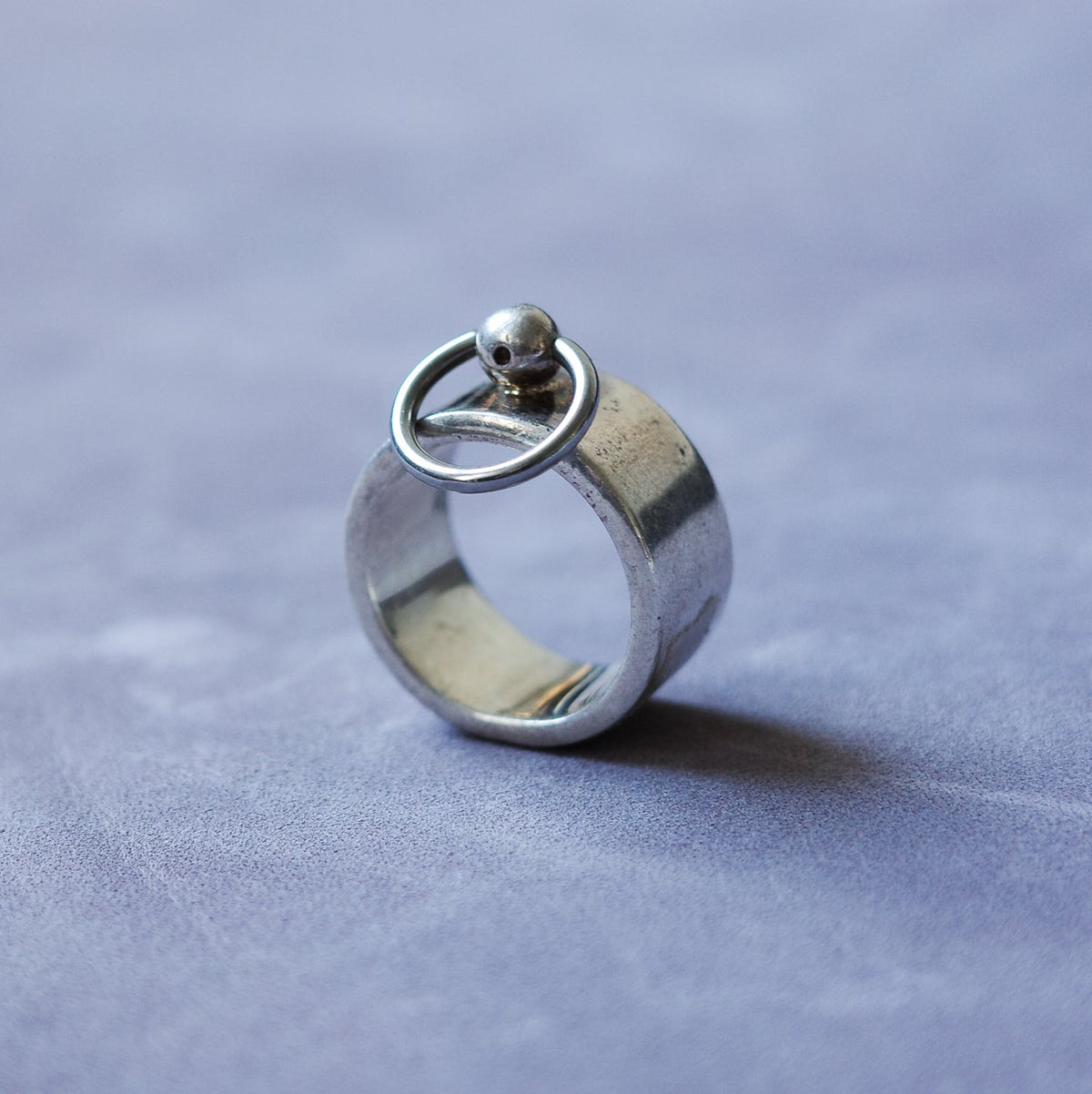 Solid band ring with hoop