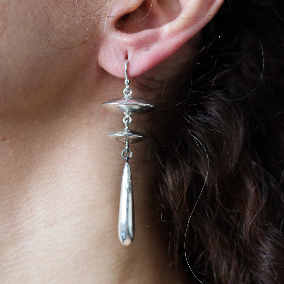 Orbit dangle earrings