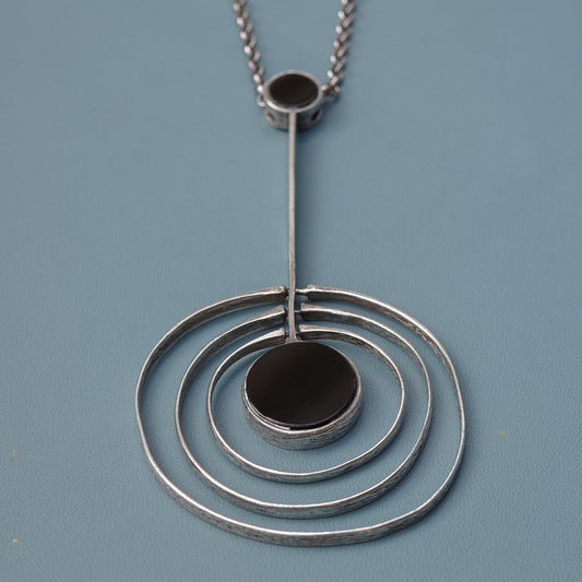 Finnish orbit statement neck piece