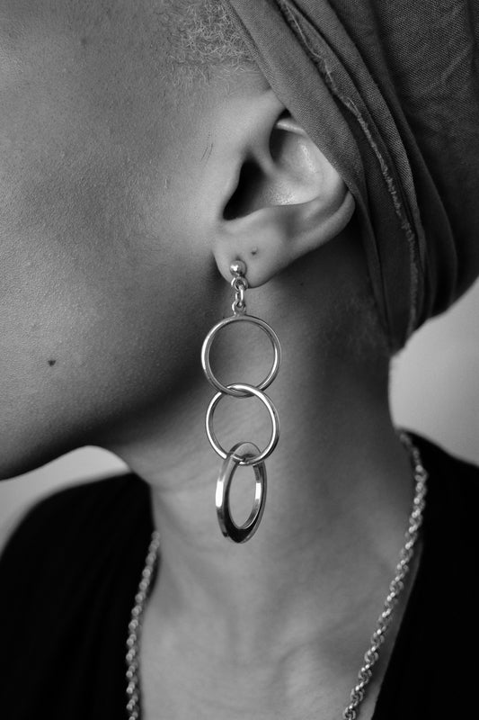 Modernist trio of silver hoops